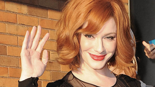 Holy shit, that’s Christina Hendricks’ hand on the <i>American Beauty</i> poster
